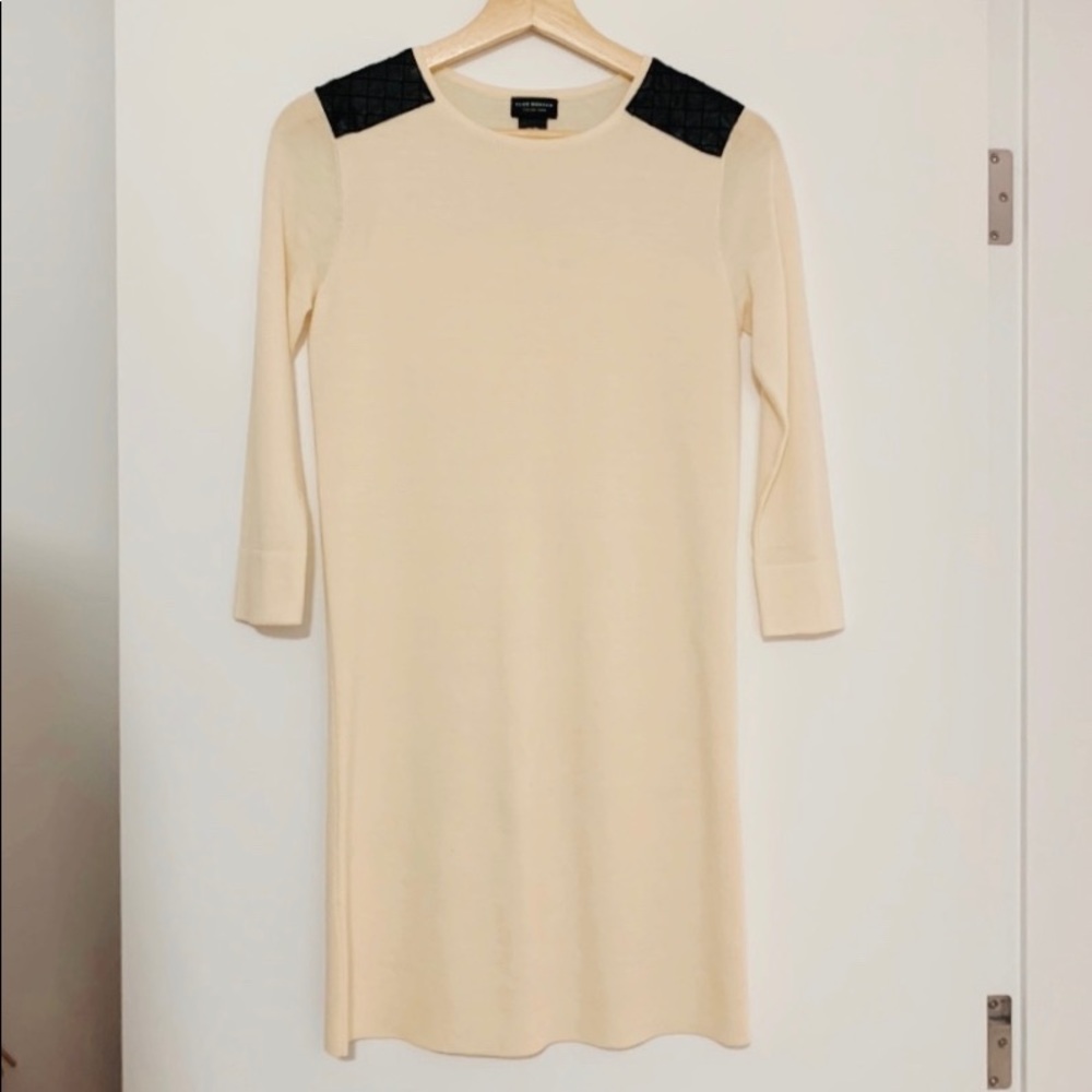 Creamy colour dress with black leather decoration
